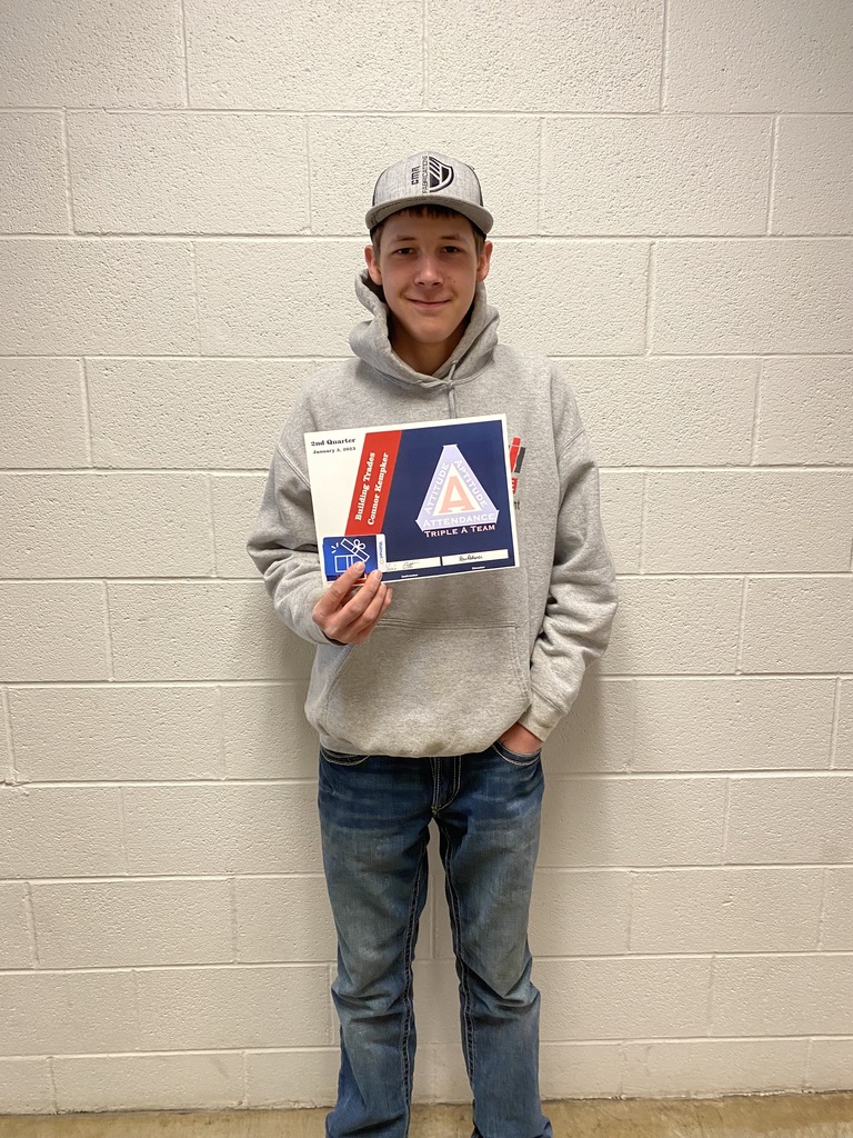 Connor Kempker with his "Triple A" student award